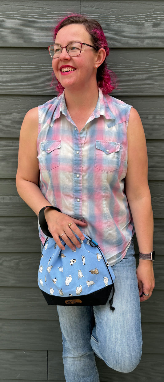 Kato Drawstring Bag | Scowling Cats in Sunglasses on Light Blue | Handpicked Japanese Fabrics, Handcrafted Bags Made in Canada