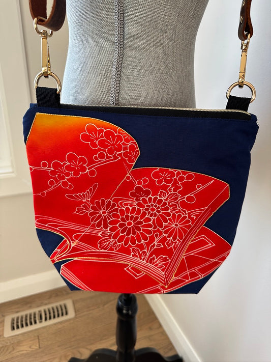 Upcycled Obi Wedge Cross Body Bag | Gradient Red Books on Navy with Gold Accents